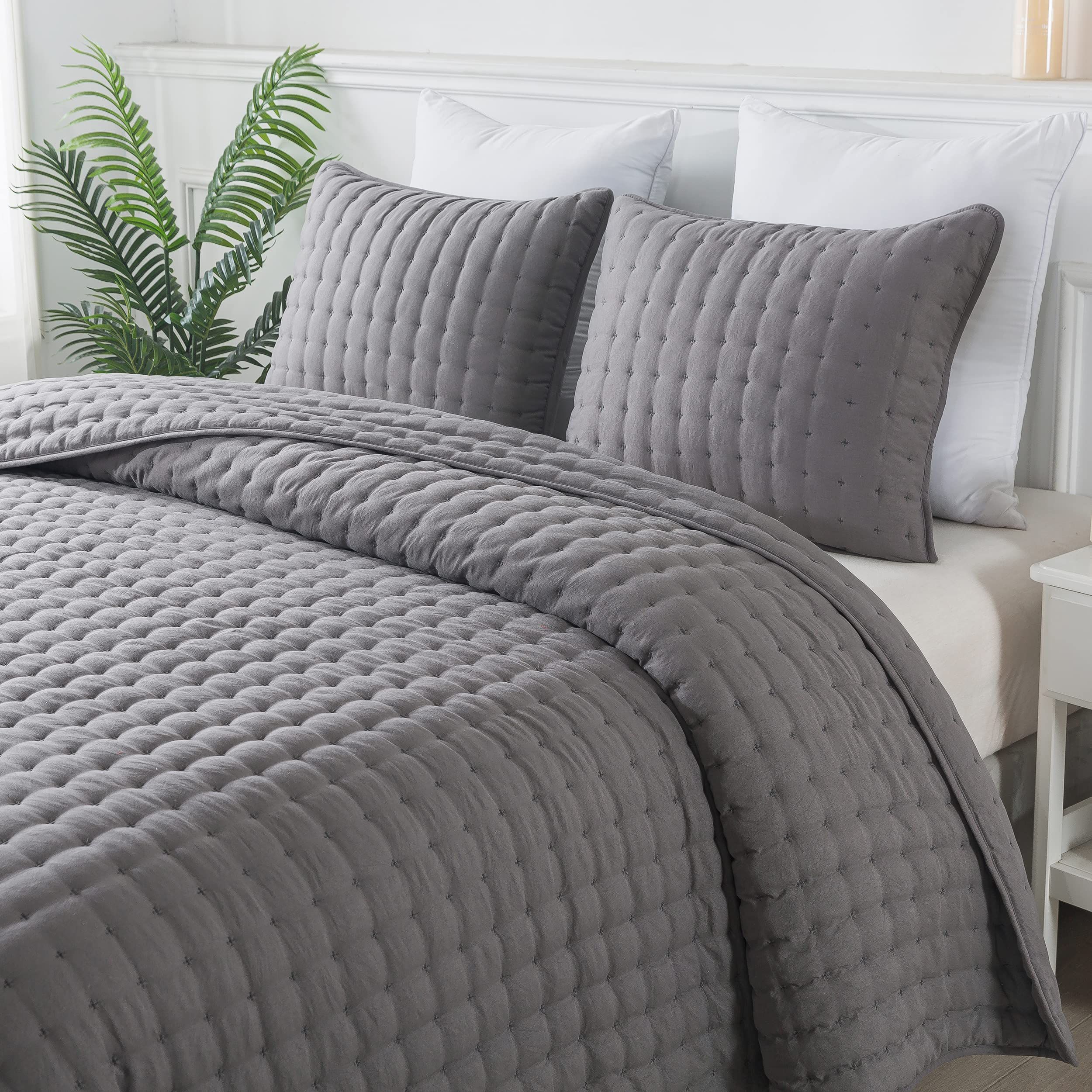 WDCOZY's dark grey quilt set for California king beds arrives with matching pieces, giving the whole room a coordinated grey finish.