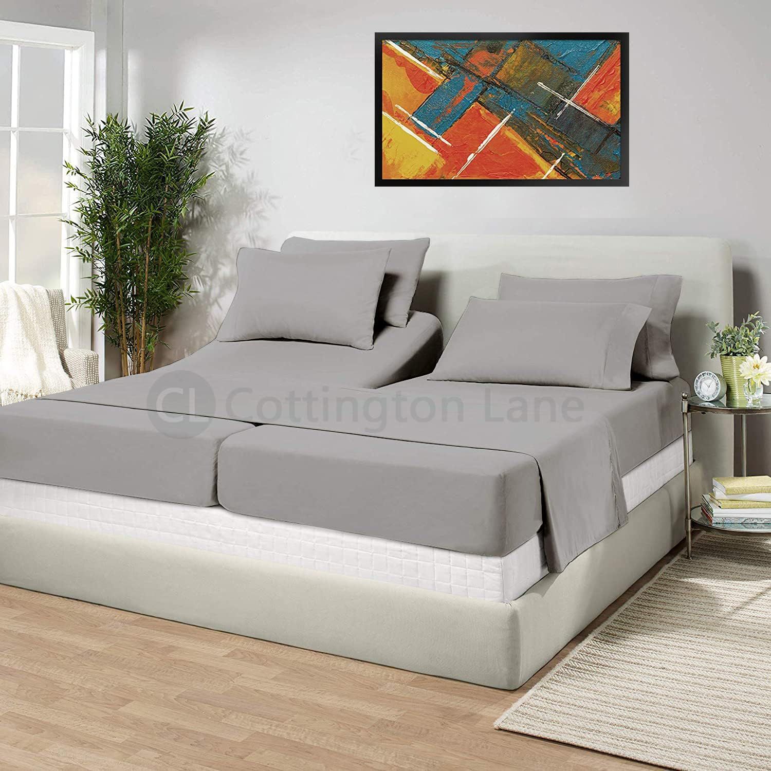 A split king divider sits between two twin XL mattresses on an adjustable base, closing the middle gap so the bed feels like one surface.